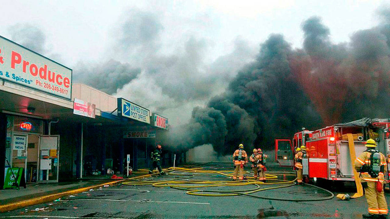 Firefighters respond in November 2016 to a strip mall fire on Kents West Hill. FILE PHOTO