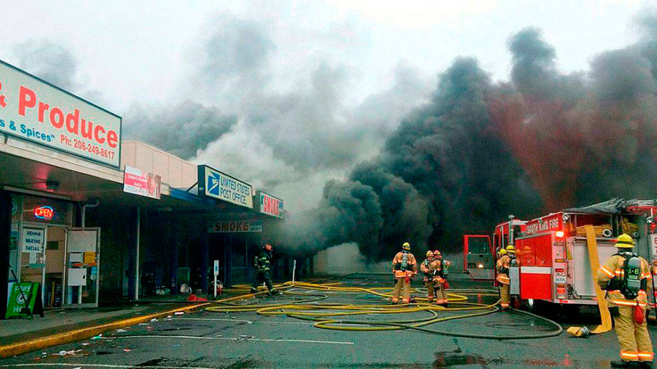 Firefighters respond in November 2016 to a strip mall fire on Kent’s West Hill. FILE PHOTO