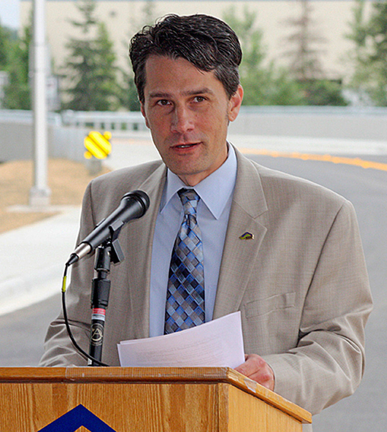 Kent City Councilmember Dennis Higgins speaks during the opening of the 72nd Avenue South extension between South 196th Street and South 200th Street in 2017. FILE PHOTO/Mark Klaas