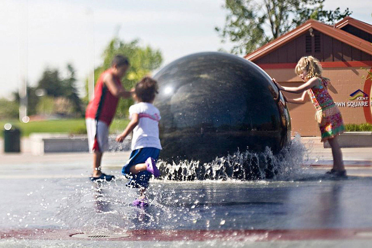 Children enjoy the fountain at Town Square Plaza in downtown Kent. COURTESY PHOTO, City of Kent