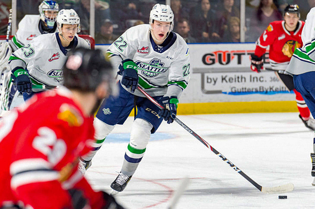 Luke Bateman controls the puck for the Seattle Thunderbirds during their game Dec. 28 against the Portland Winterhawks at the accesso ShoWare Center. Portland won 4-1. COURTESY PHOTO, Brian Liesse, T-Birds
