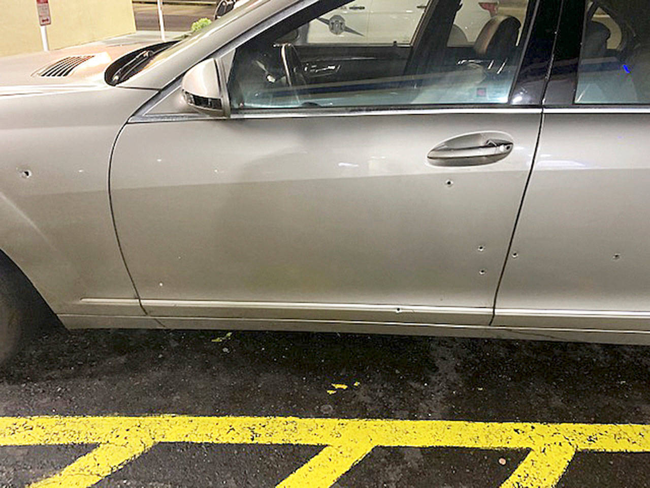 The Washington State Patrol released this photo of a car riddled with bullet holes after a shooting Thursday along Interstate 5 in Kent. The driver suffered a gunshot wound to the lower back. COURTESY PHOTO, State Patrol
