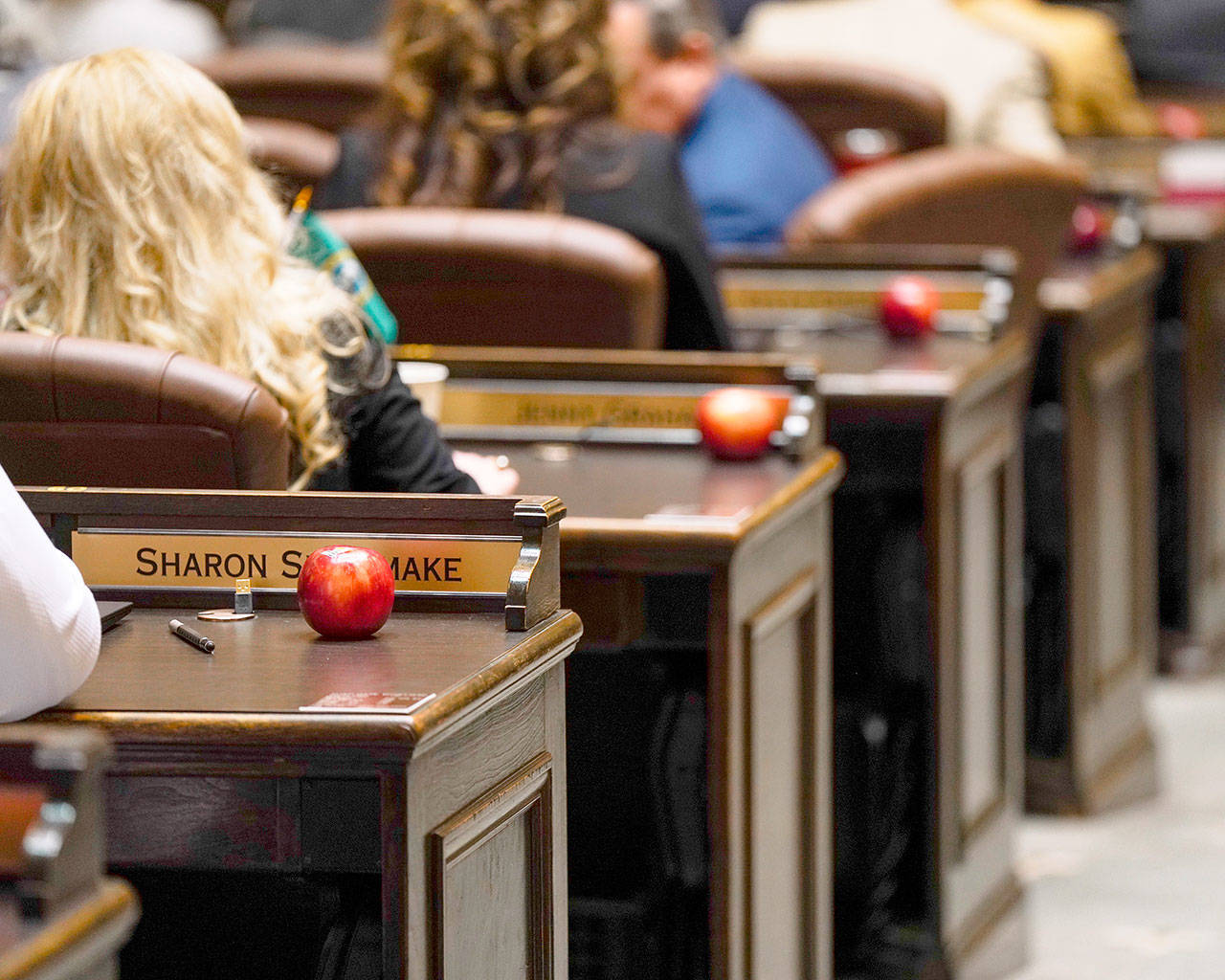 Cosmic Crisp apples were placed on the desk of legislators in Olympia during Gov. Jay Inslee’s State of the State speech Jan. 14. COURTESY PHOTO, Office of the Governor