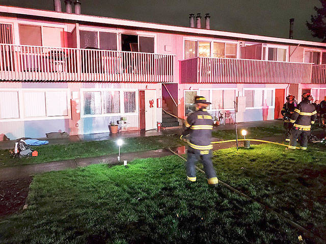 Puget Sound Fire crews respond Wednesday night to a condo fire in the 9600 block of South 248th Street in Kent. COURTESY PHOTO, Puget Sound Fire