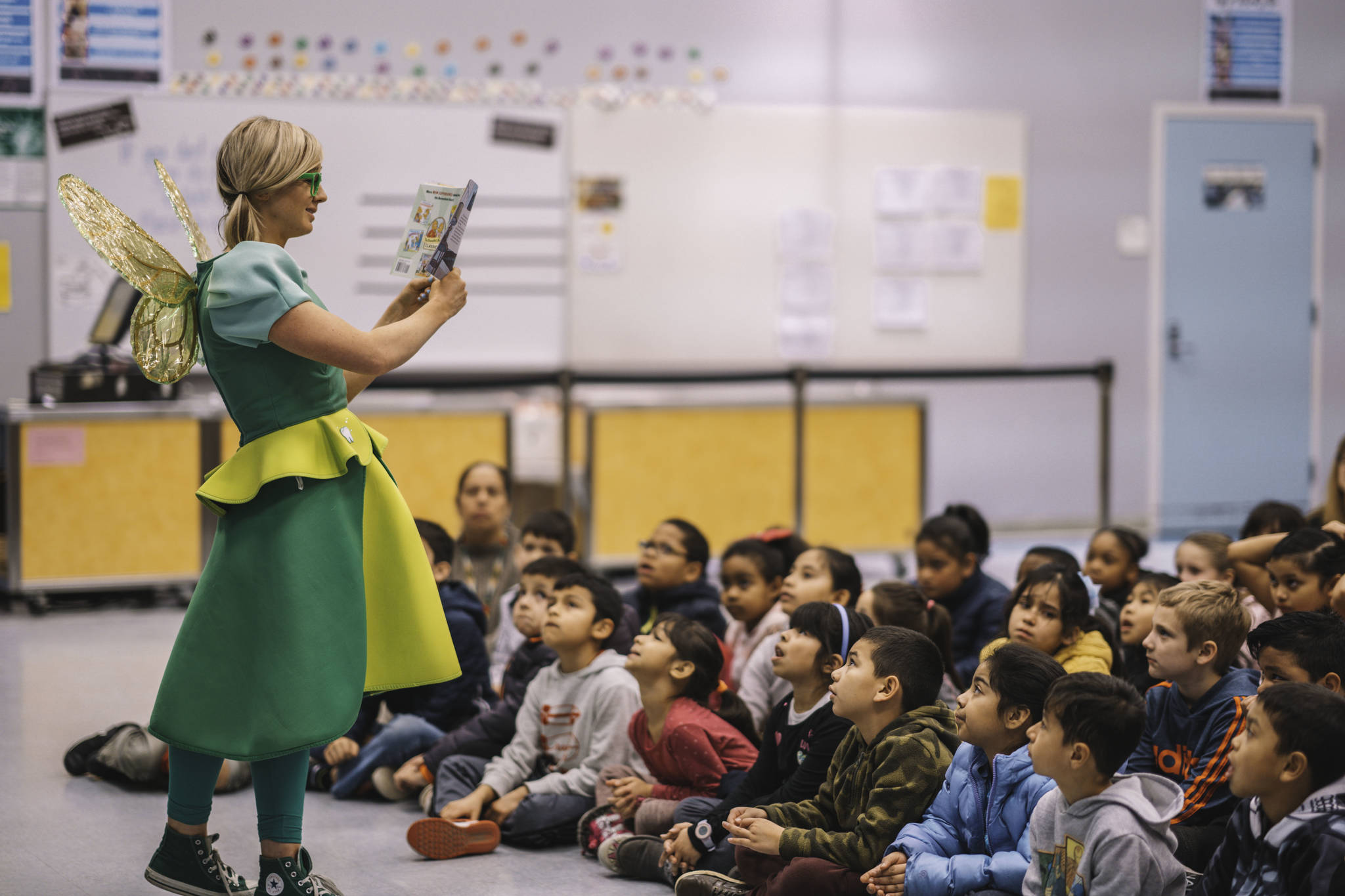 The Tooth Fairy visits Kent students for a story time reading and fun dental facts. Students received a new toothbrush and a better understanding of the importance of a healthy smile. COURTESY PHOTO, Daniel Macadangdang