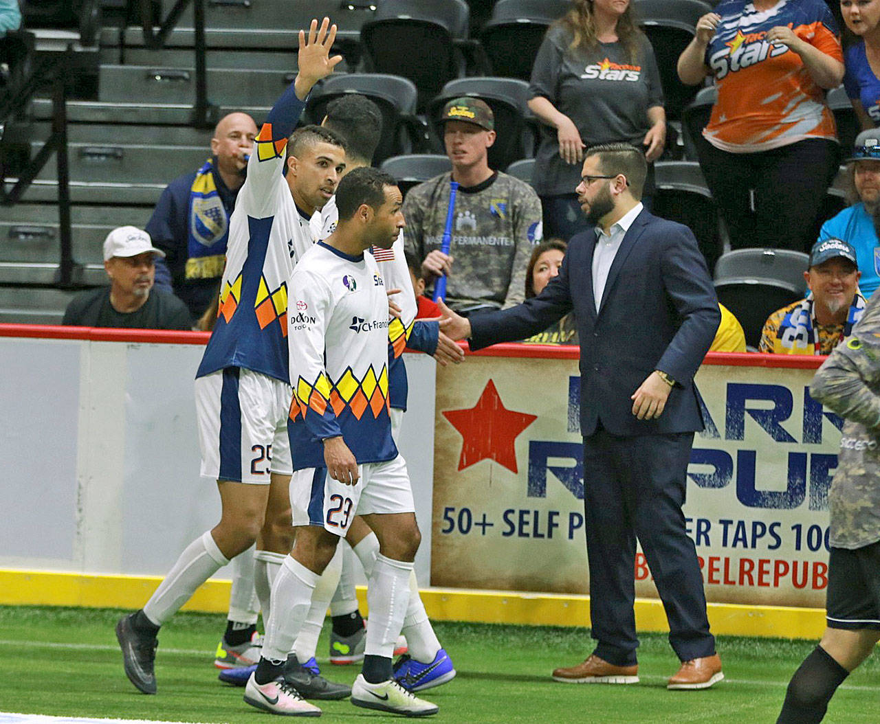 Stars coach Adam Becker congratulates Mike Ramos on his second quarter goal during Tacoma’s 6-2 loss in San Diego on Sunday. COURTESY PHOTO, MASL Media/San Diego Sockers