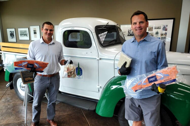 J. Stephan Banchero, III, president of Sound Bites (left) with John Moscrip, chief operating officer, Duke’s Seafood. Sound Bites delivers fresh organic produce, frozen protein and restaurant meals everywhere in Snohomish, King and Pierce counties.