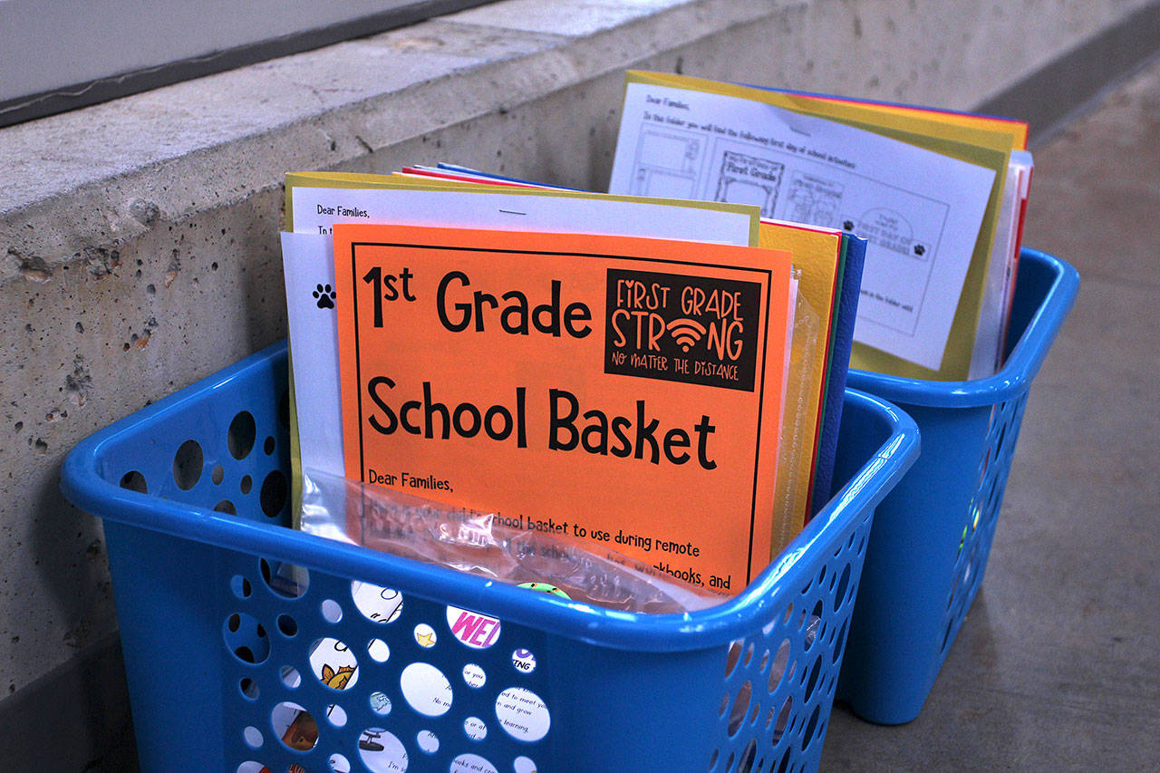 Supplies is prepped and ready for pick-up at Lakeland Elementary on Sept. 3, to help families adjust to remote learning. Olivia Sullivan/the Mirror