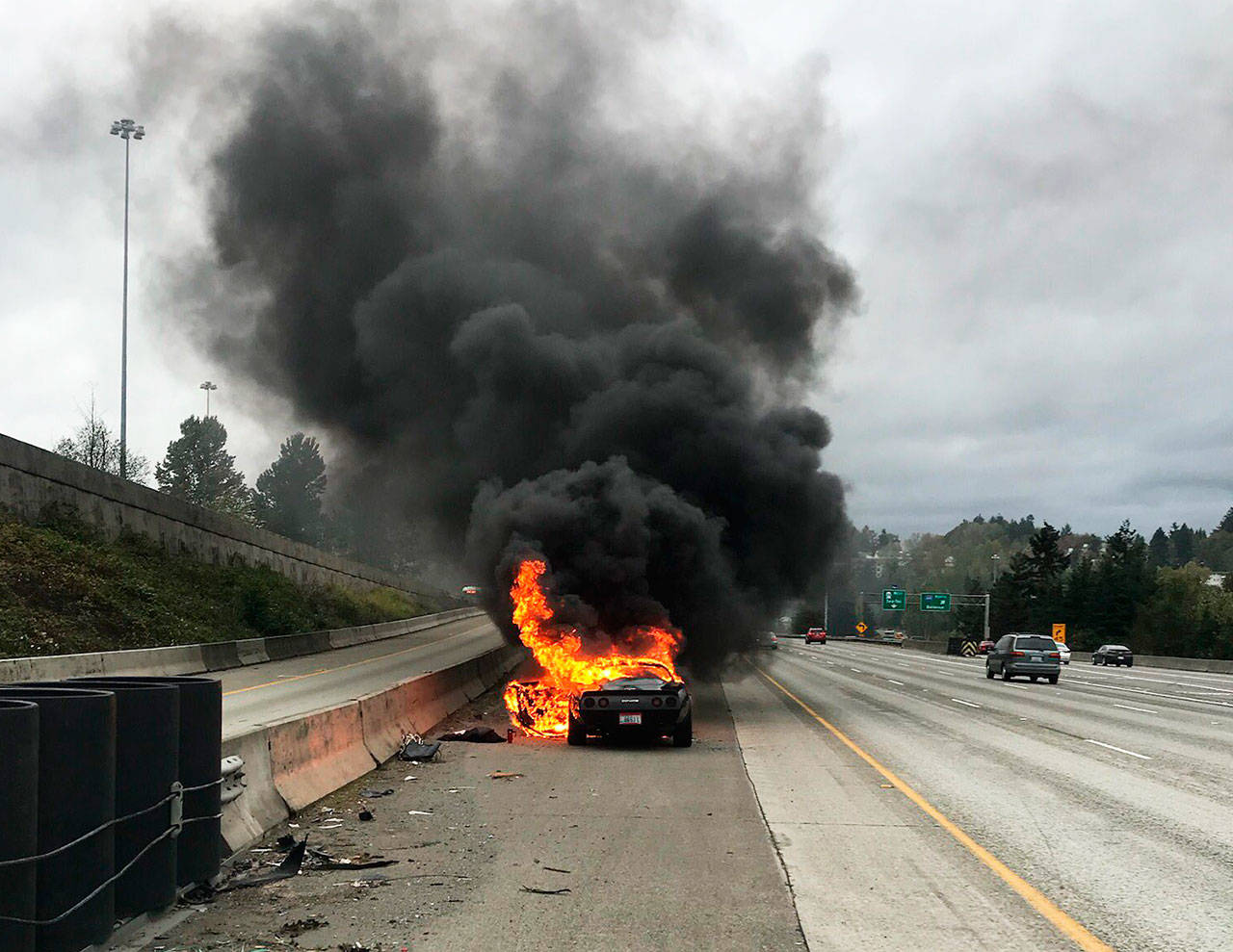 A Corvette catches fire Sunday, Nov. 1 along Interstate 5 in SeaTac. COURTESY PHOTO, Puget Sound Fire