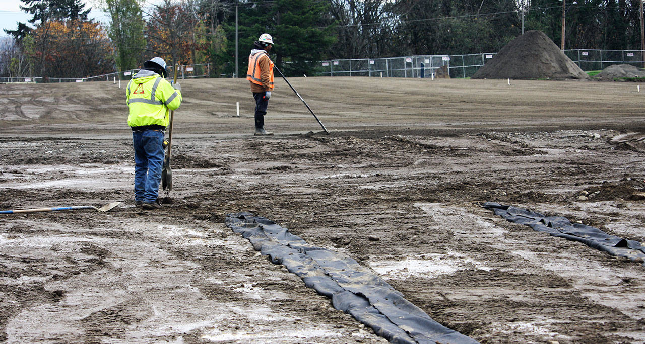 All of the original grass has been removed as construction crew members prepare the ground for a new field Nov. 9 at West Fenwick Park in Kent. STEVE HUNTER, Kent Reporter