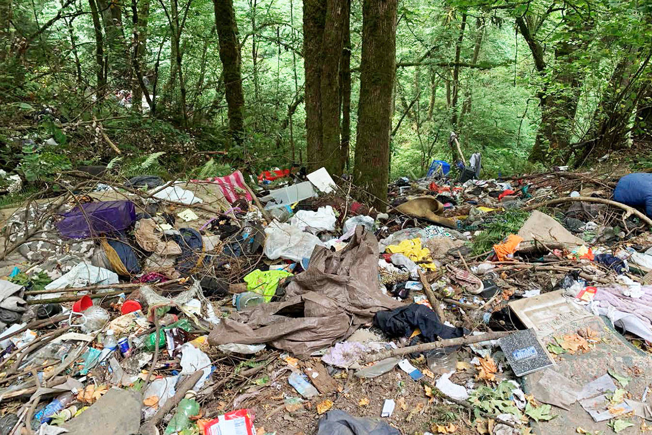 Trash from homeless encampments fills the ground at Mill Creek Canyon in Kent. COURTESY PHOTO, City of Kent