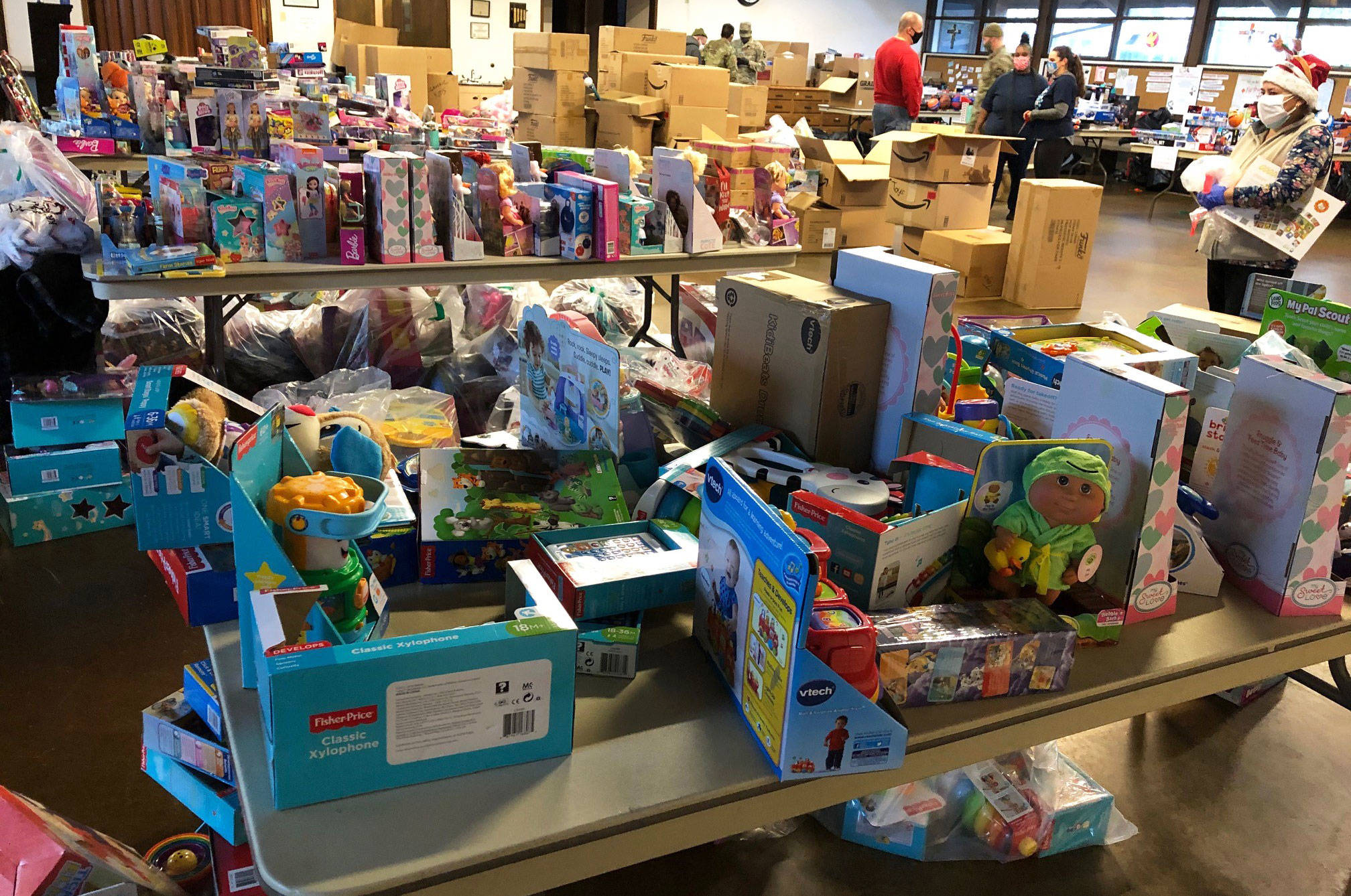 Volunteers dropped off hundreds of toys Dec. 18 at Kent Lutheran Church from the annual Kent firefighters Toys of Joy drive to be distributed to children through the Kent Food Bank. COURTESY PHOTO, Puget Sound Fire