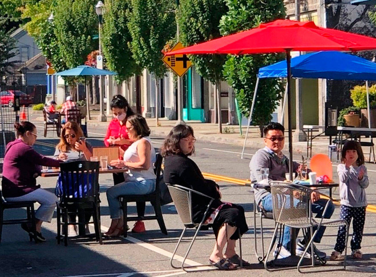 Last summer, people took advantage of the outdoor dining along First Avenue between Gowe and Titus streets in downtown Kent. In Phase 2 of the governor’s reopening plan, which was announced Jan. 28, restaurants can reopen at a maximum 25% capacity and a limit of six people per table. Photo courtesy of Kent Downtown Partnership