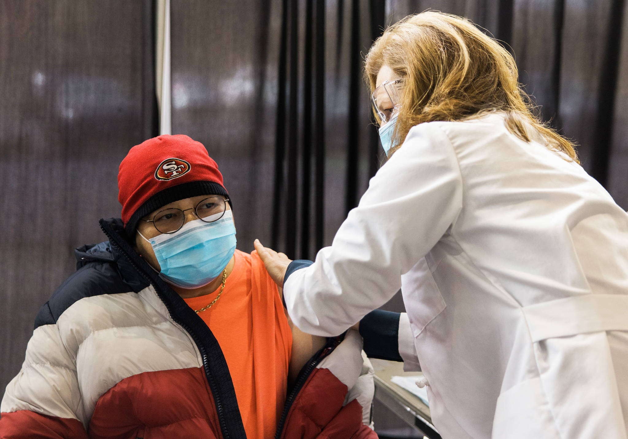 Congresswoman Kim Schrier, D-Sammamish, delivers a COVID-19 vaccination on Monday, March 15 at the accesso ShoWare Center in Kent. COURTESY PHOTO, Kim Schrier