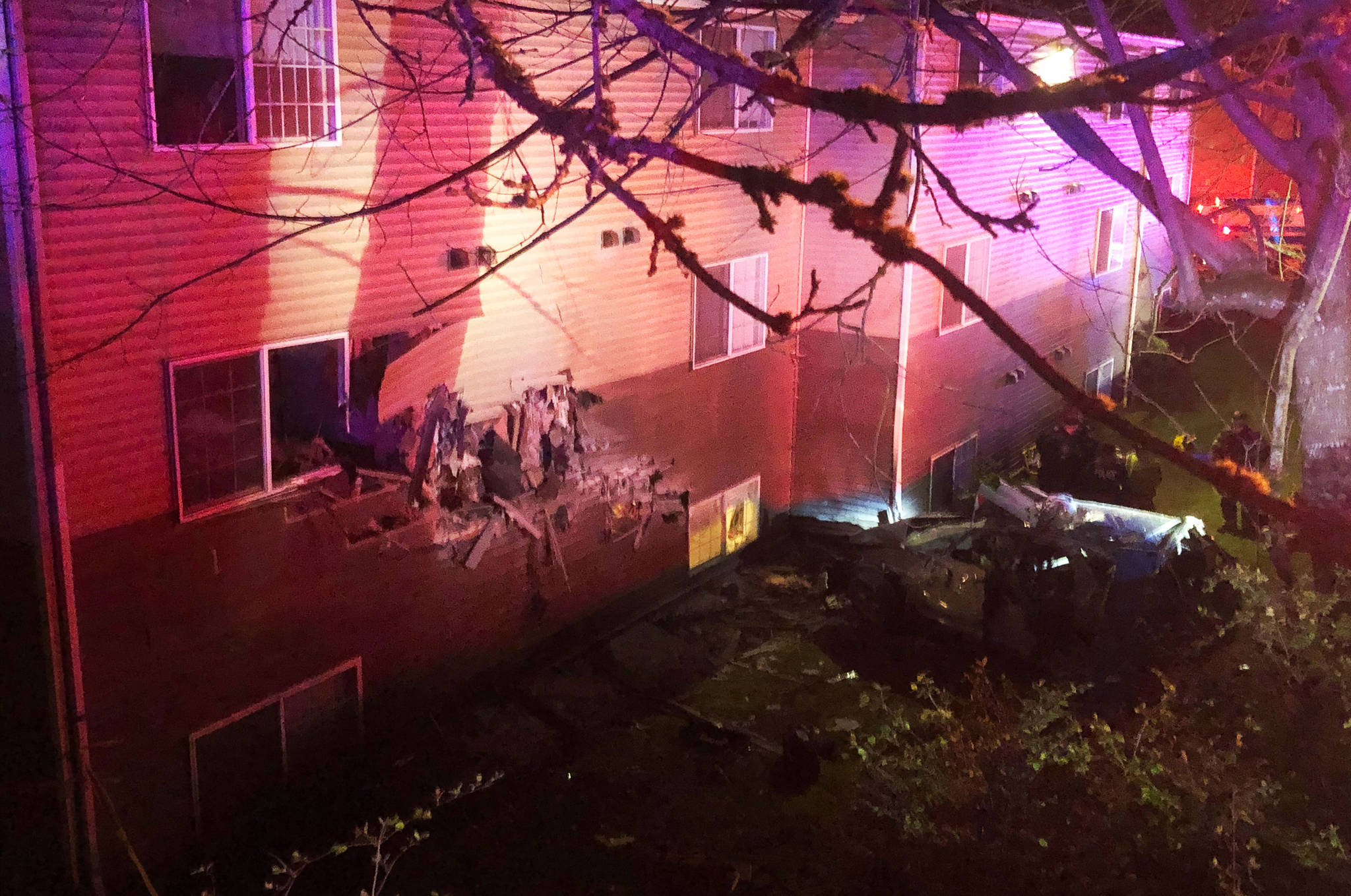 Six people were injured when a car crashed into an apartment building April 4 in Kent in the 8700 block of South 259th Street. COURTESY PHOTO, Puget Sound Fire