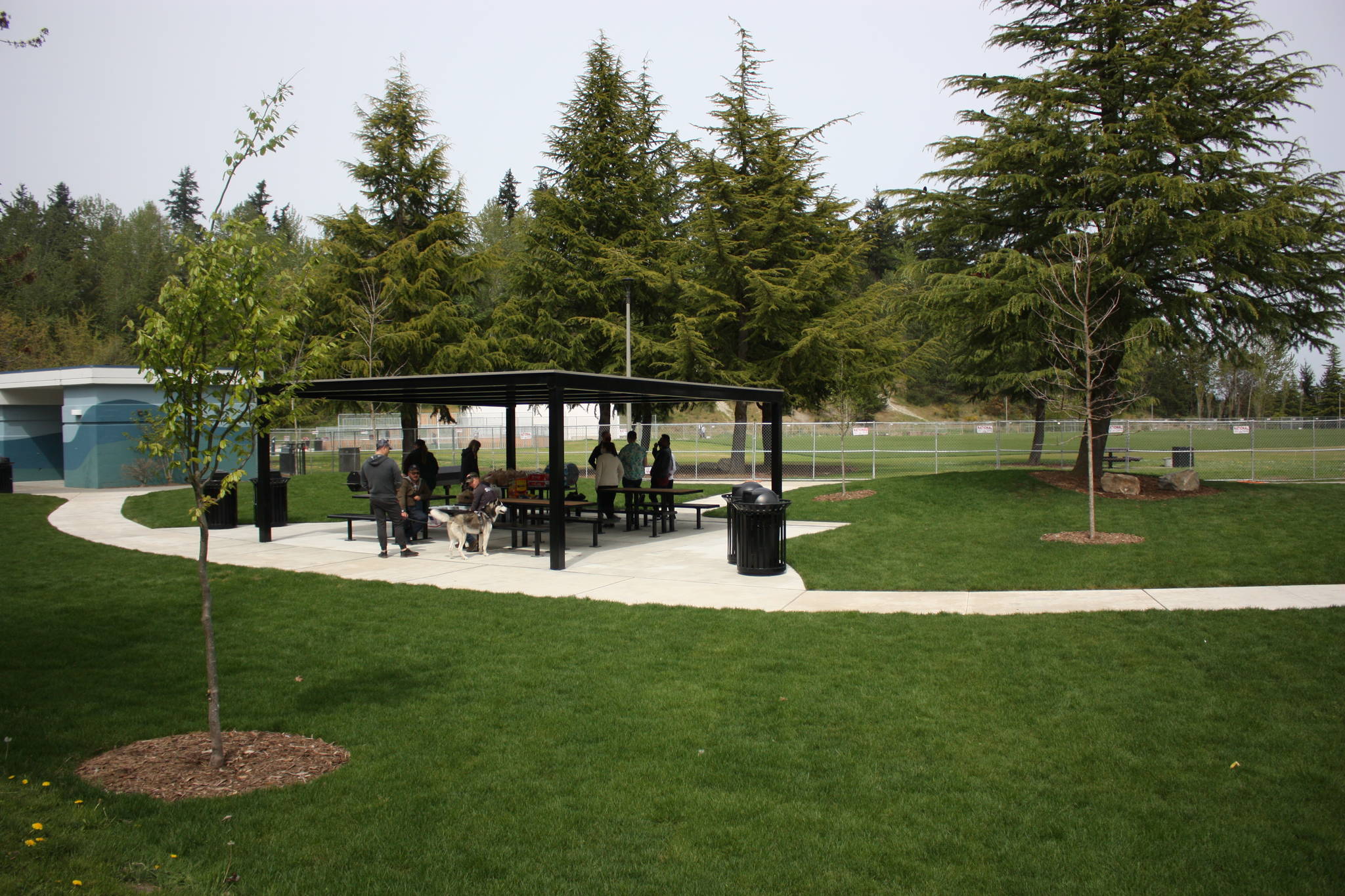 Locals host a barbecue using the park's new sheltered picnic area. CAMERON SHEPPARD, Sound Publishing