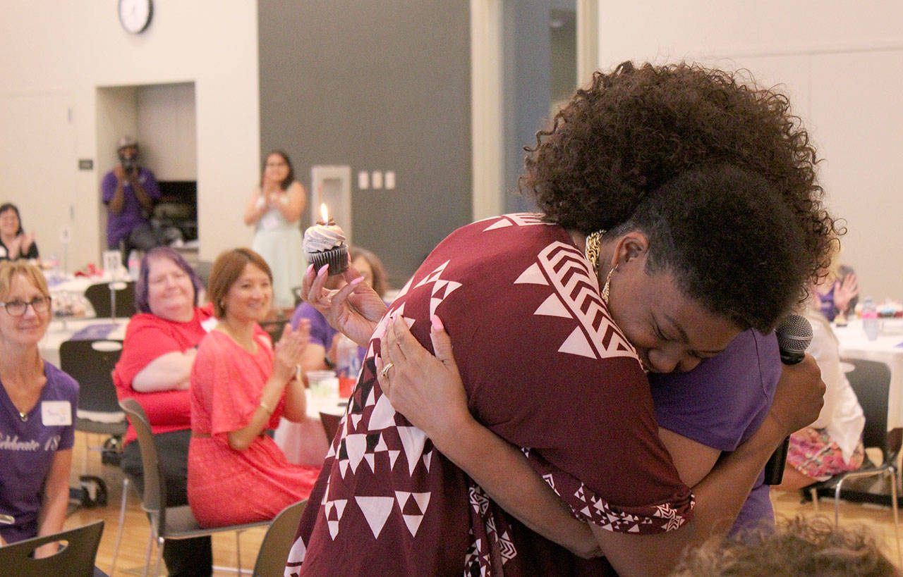Kathie Nguyen embraces Eileen & Callies Place founder Natalie Ellington. Celebrate 18!, hosted on July 13, 2019, was also the day of Ellingtons birthday. Olivia Sullivan/staff photo