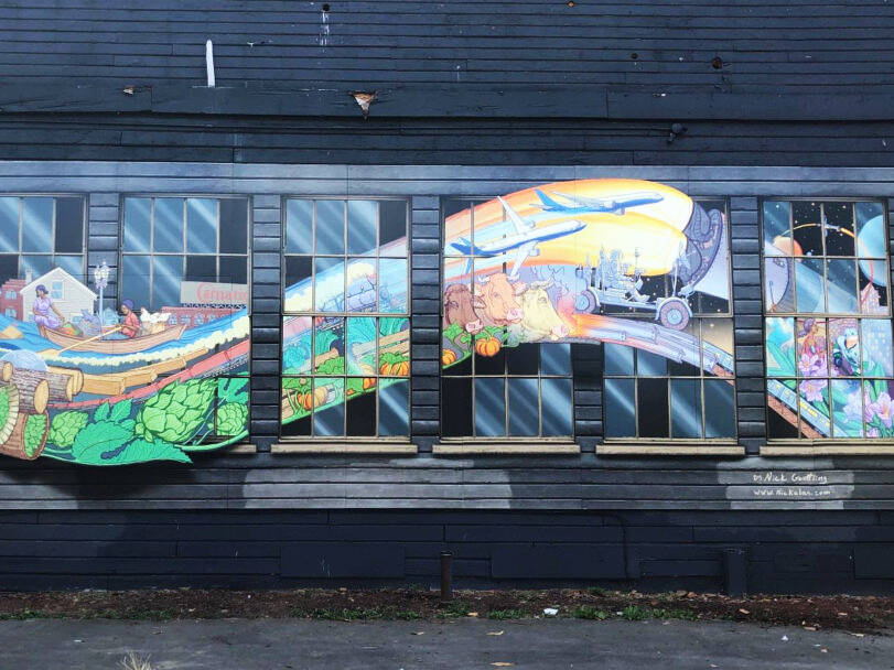 A mural by Nick Goettling covers a wall on the Page Turner Books building at 314 W Meeker St., in downtown Kent. COURTESY PHOTO, City of Kent