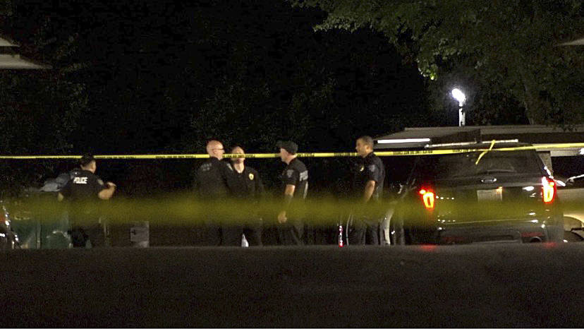 Officers at the scene of a fatal shooting at the Glen Park Apartments on July 8. Photo courtesy of South Sound News