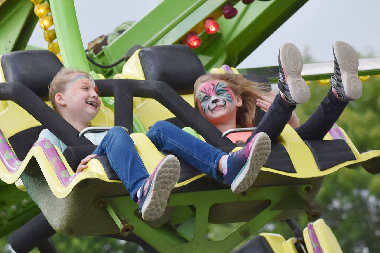 The Enumclaw Expo Center is expecting to have a full carnival available to visitors of the King County Fair this year, despite the coronavirus. Pictured are some kids at the 2019 fair. File photo by Kevin Hanson