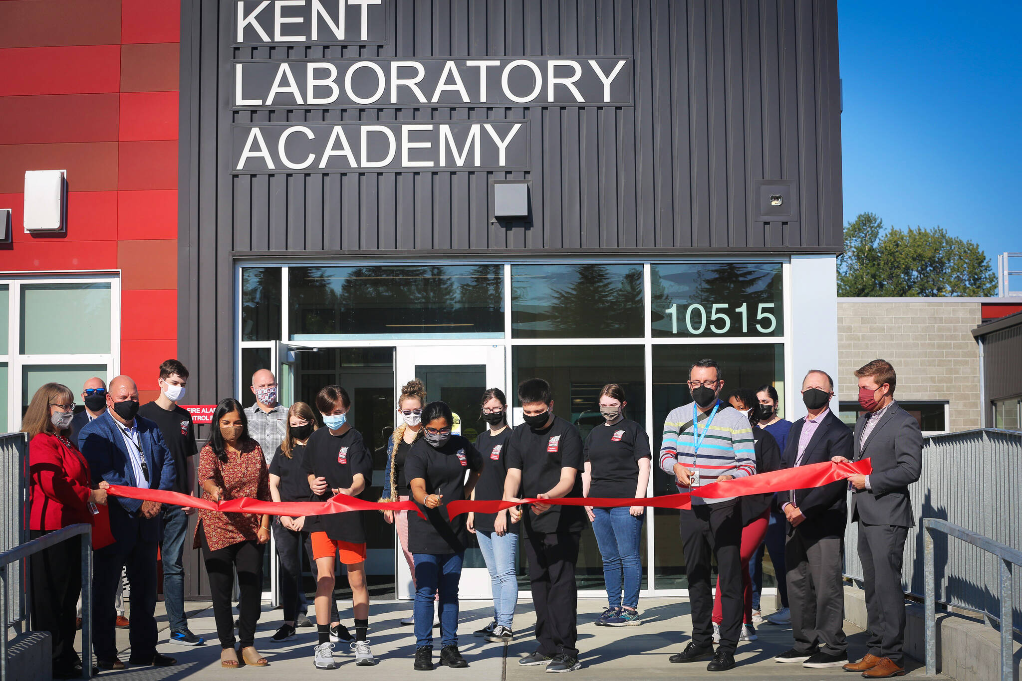 Kent School District leaders and others celebrate the opening of the Kent Laboratory Academy on Aug. 28. COURTESY PHOTO, Kent School District