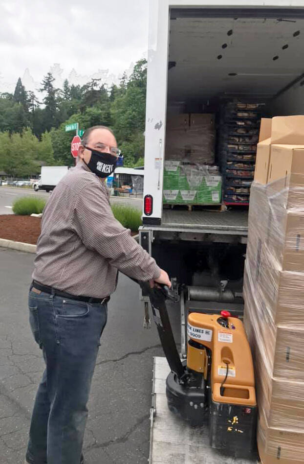Dave Mitchell, of Kent, received a Seattle Mariners Hometown Hero award for his work to help others during the pandemic, including organizing food donations. COURTESY PHOTO