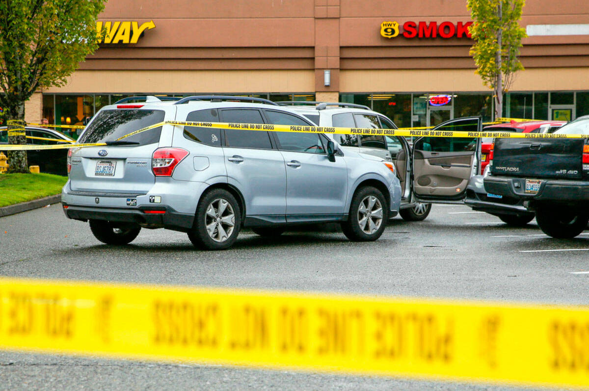 The scene where police officers from Kent and Federal Way shot and injured a man at the end of a car chase Monday afternoon, Sept. 27, in a Safeway parking lot south of Snohomish. COURTESY PHOTO, Kevin Clark/The Herald