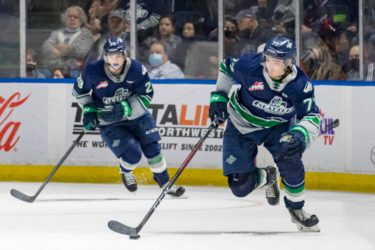 Seattle Thunderbirds Jared Davidson, left, and Alessandro Segafredo compete against Spokane during an Oct. 15 game at the accesso ShoWare Center in Kent. COURTESY PHOTO, Brian LIesse, Seattle Thunderbirds