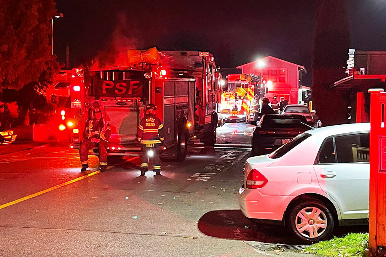 Puget Sound Fire responds early Sunday morning, Nov. 21 to a residential fire at the Paradise Mobile Home Park in the 400 block of Washington Avenue North. COURTESY PHOTO, Puget Sound Fire