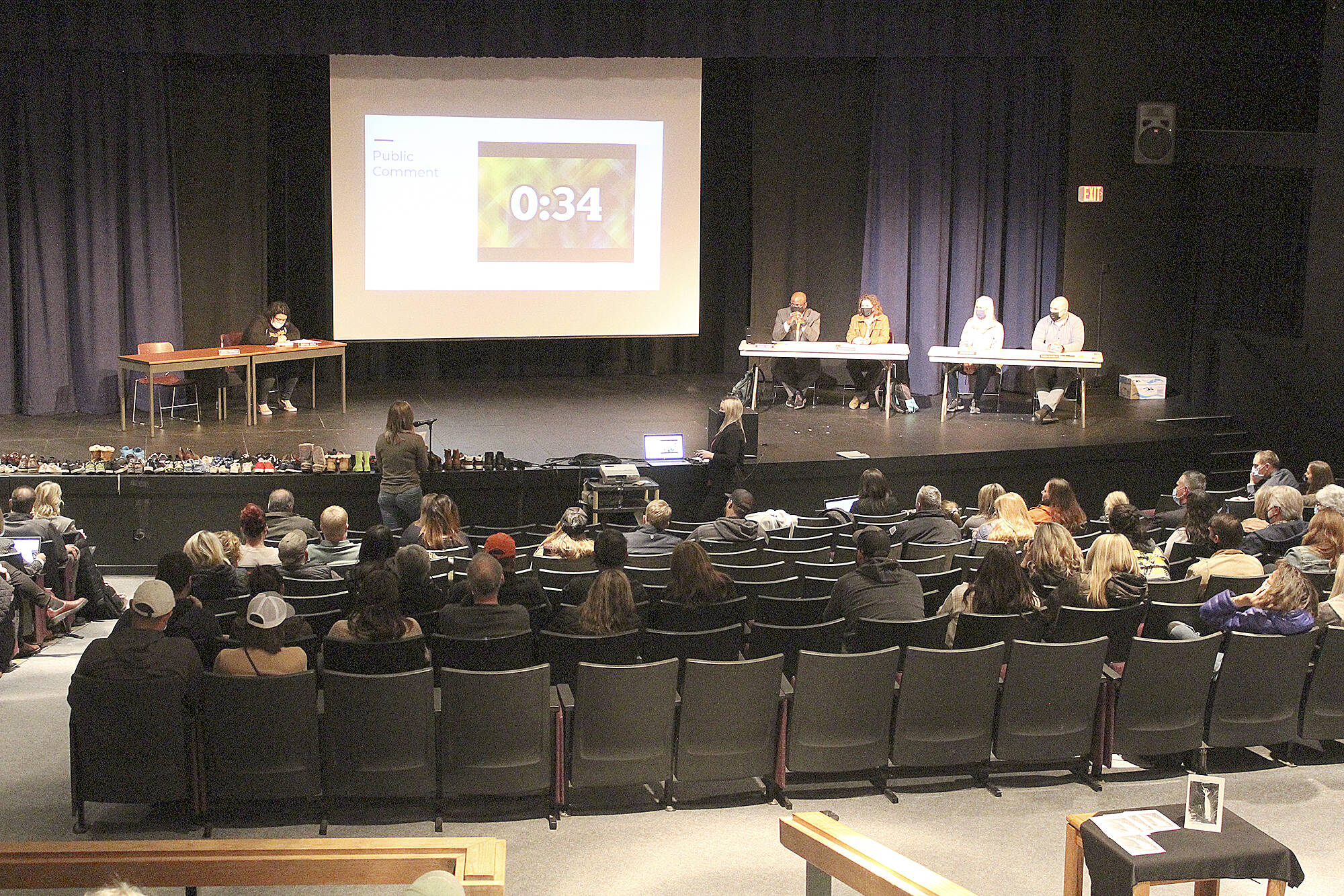 So many people wanted to attend the Nov. 22 school board meeting that the venue had to change from the high school library to the auditoriu. Photo by Ray Miller-Still