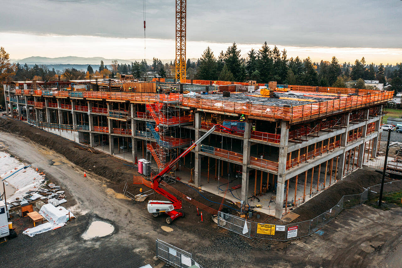 Crews construct a 500-spot parking garage for Sound Transit’s Kent Des Moines Station light rail stop along Pacific Highway South, just south of Kent Des Moines Road. COURTESY PHOTO, City of Kent