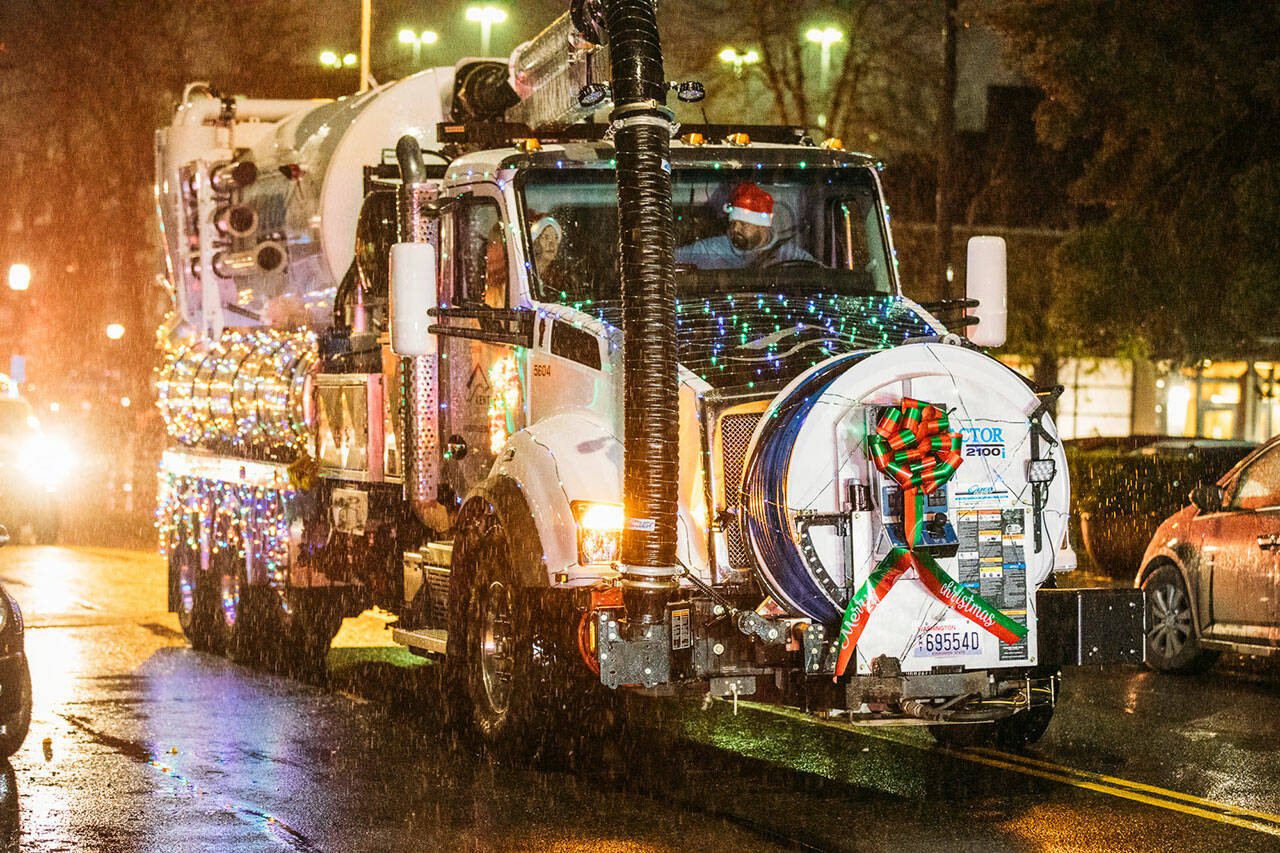 City of Kent Public Works crews decorated on of their large trucks to participate in the annual parade Dec. 4 in downtown Kent. COURTESY PHOTO, City of Kent