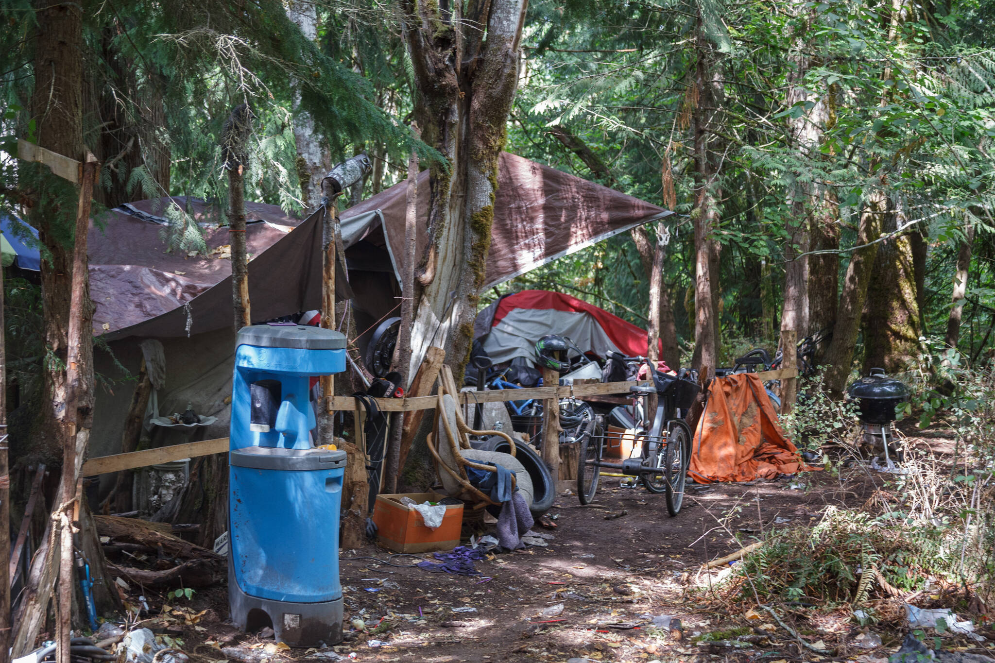 Homeless encampment in wooded area in Auburn on Friday, Aug. 27, 2021. Photo by Henry Stewart-Wood/Sound Publishing