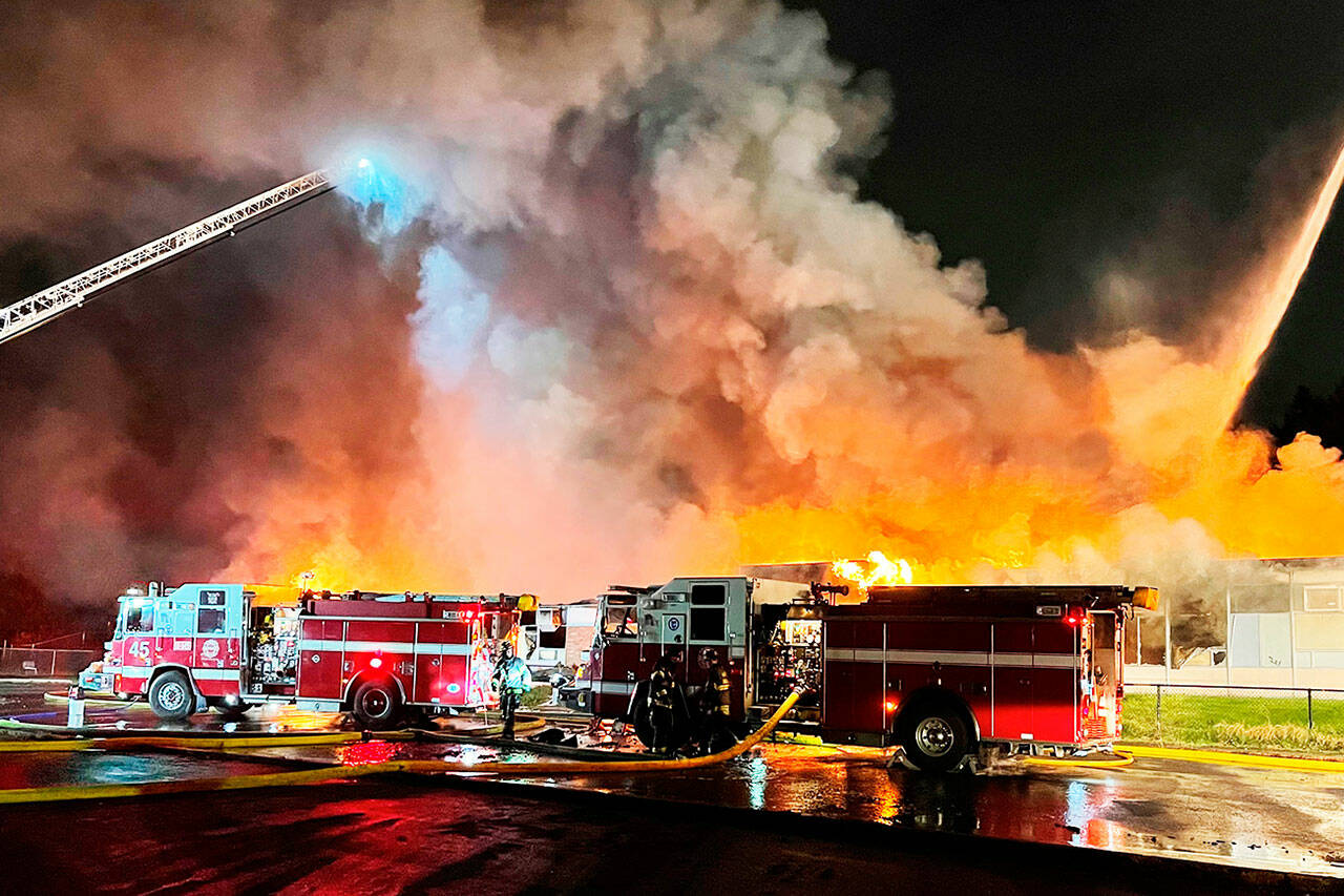 Firefighters fight a blaze Feb. 16 at a former SeaTac elementary school along South 200th Street, south of Sea-Tac Airport. COURTESY PHOTO, Puget Sound Fire