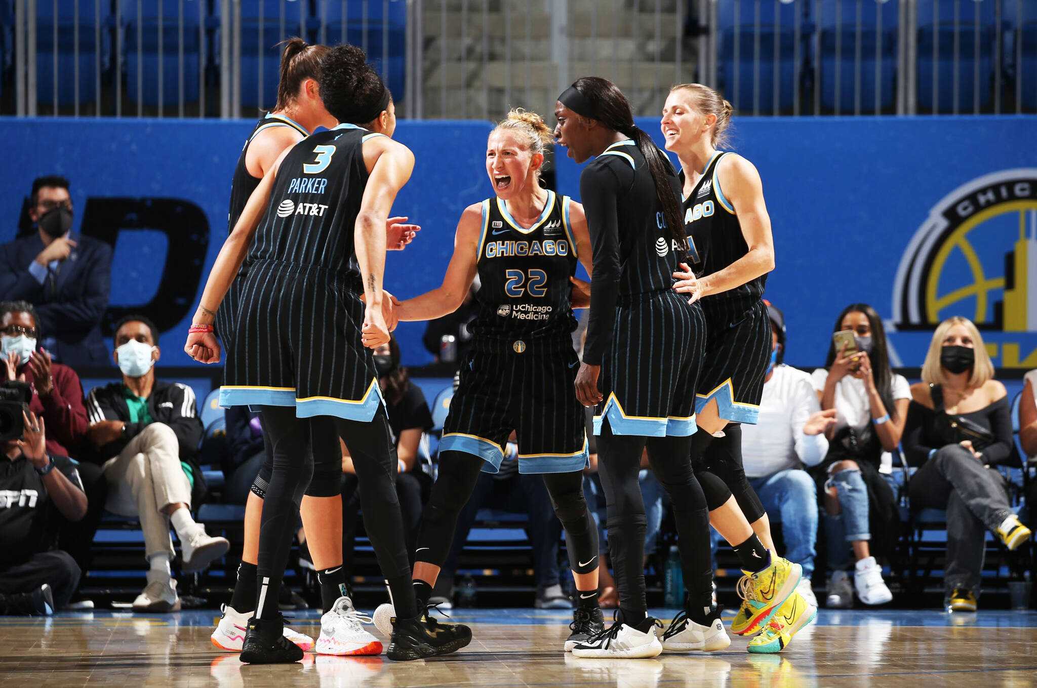 Courtney Vandersloot, center, a former Kentwood High School star, signed a one-year contract Feb. 17 to return to the WNBA champion Chicago Sky. COURTESY PHOTO, Chicago Sky