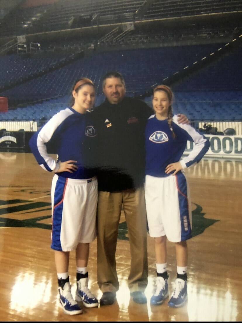 Aly Carr (left) and Cait Carr (right) with their father, Chris Carr. (Photo courtesy of Marla Carr)