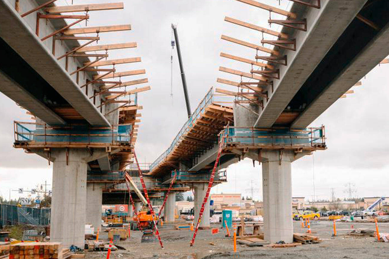Crews work on the elevated guideway for the Federal Way Link light rail extension from SeaTac through Kent to the Federal Way Transit Center. COURTESY FILE PHOTO, Sound Transit