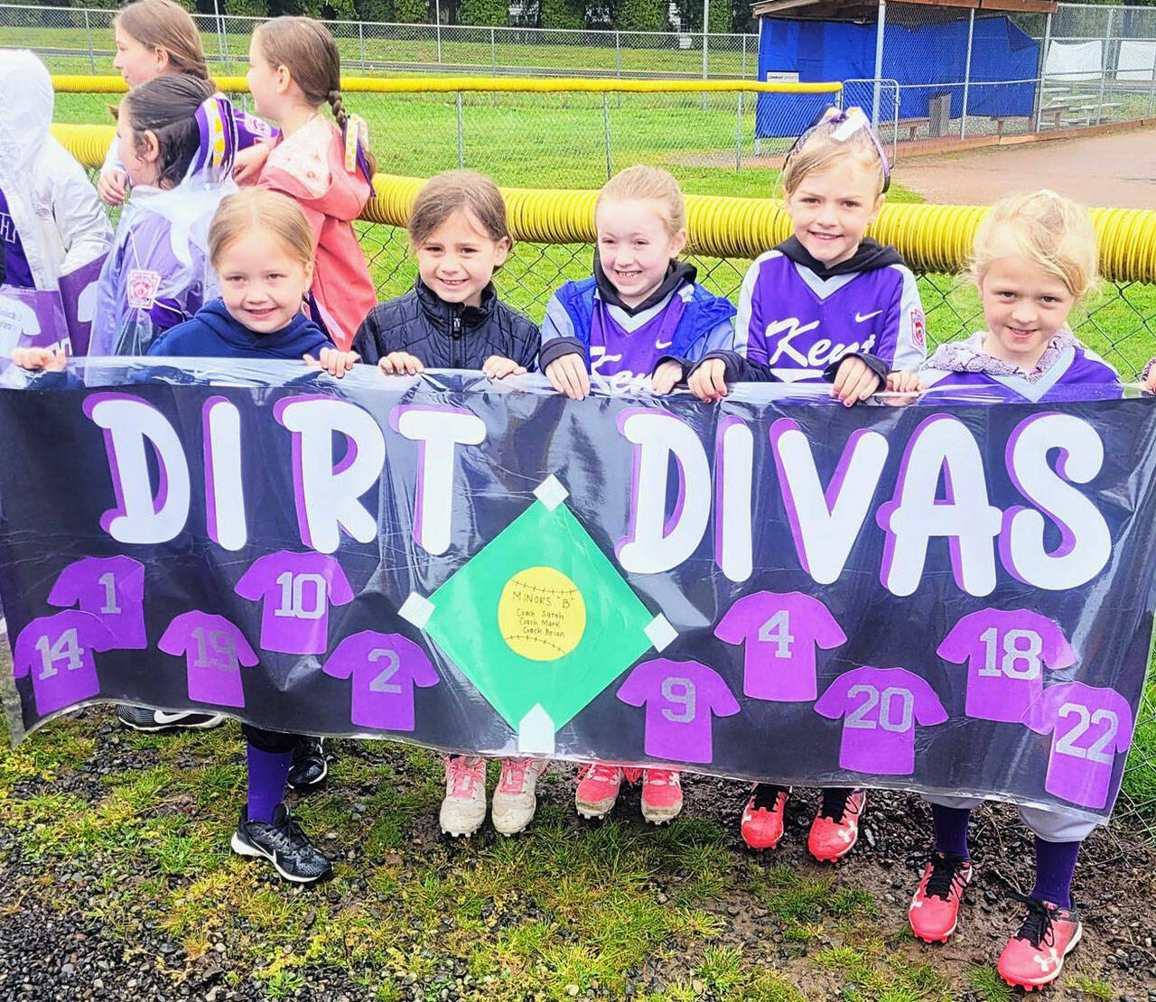 The Dirt Divas pose for a photo during Kent Little League Opening Day April 30. The league offers baseball and softball divisions. COURTESY PHOTO, Kent Little League