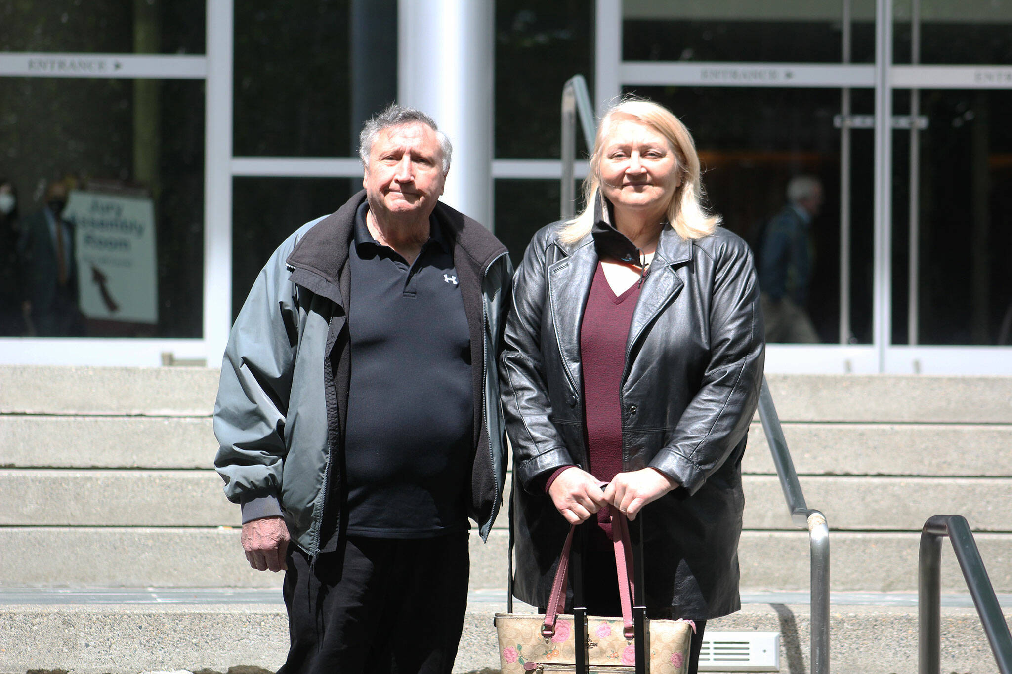 Allan “Benny” and Joann Thomas on the front steps of the federal court building in Seattle. Photo by Ray Miller-Still