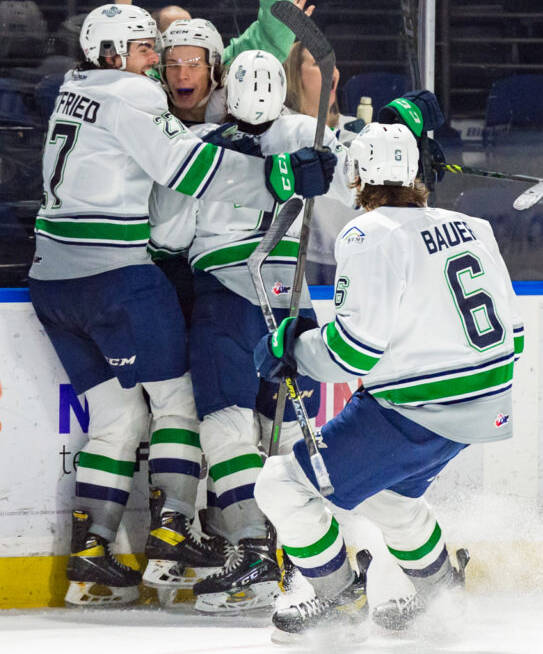 The Seattle Thunderbirds celebrate the game-winning goal by Nico Myatovic in overtime to beat the Kamloops Blazers 2-1 in a May 25 Western Hockey League playoff game at the accesso ShoWare Center in Kent. COURTESY PHOTO, Brian Liesse, Seattle Thunderbirds