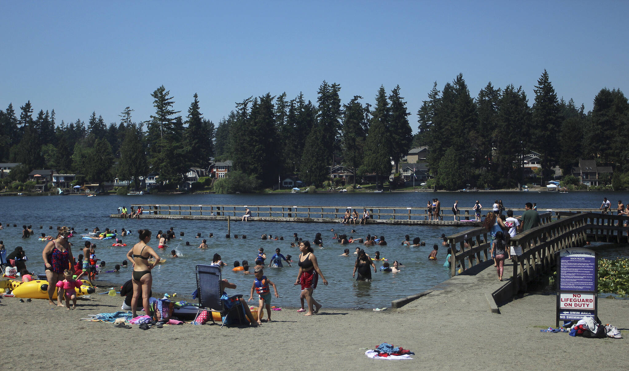Dozens of people flocked to Steel Lake to enjoy, and escape, the record temperatures on June 28, 2021. Photo by Olivia Sullivan/Sound Publishing
