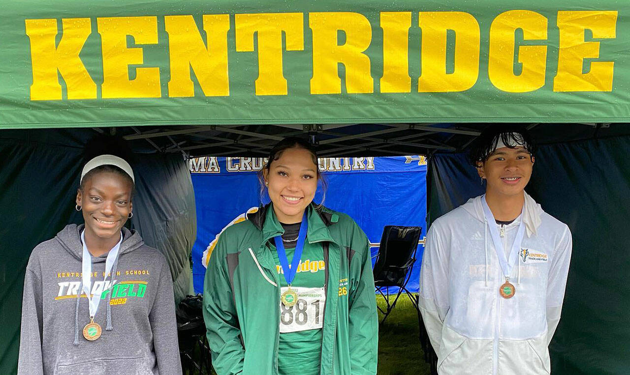 Kentridge High’s Saydi Orange, center, took first place in the javelin at the state high school track and field championships May 26-28 at Mount Tahoma High School in Tacoma. Teammates Shiney Mayanja, left, took fifth in the 100 hurdles and Jonah Tongco, right, placed third in the 100 hurdles and sixth in the long jump. COURTESY PHOTO, Kentridge High School