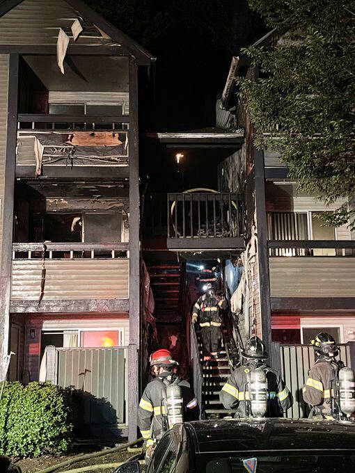 Firefighters battle a blaze June 20 at the Atrium on James Street Apartments in the 24000 block of 64th Avenue South. COURTESY PHOTO, Puget Sound Fire