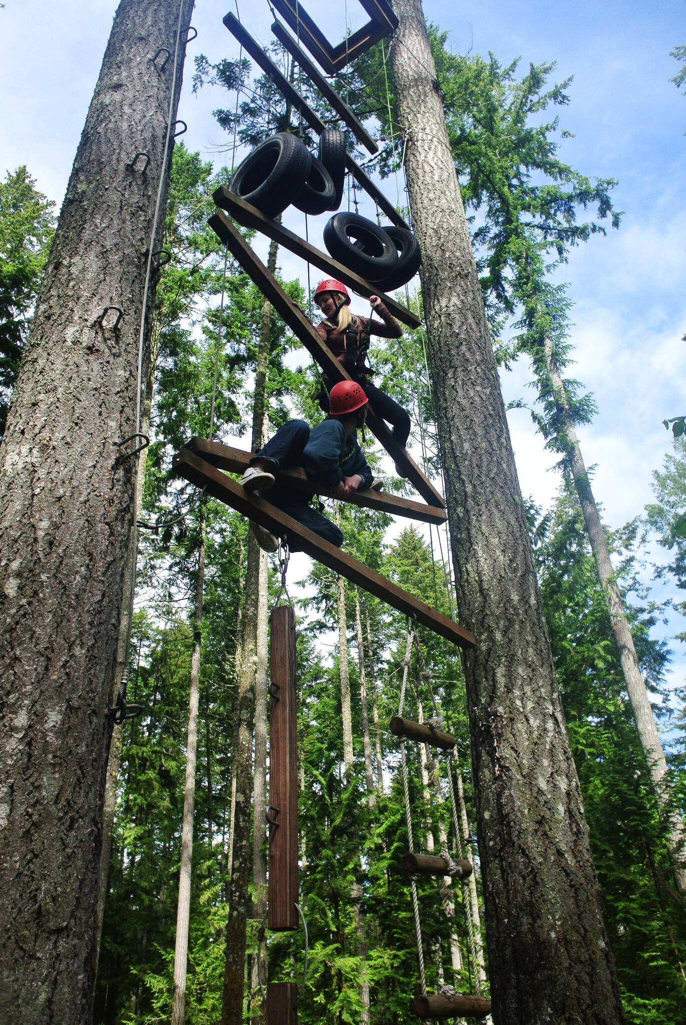 Rotary Youth Leadership Award winners participate in a climbing activity at a recent camp that featured 62 students, including six from Kent high schools. COURTESY PHOTO