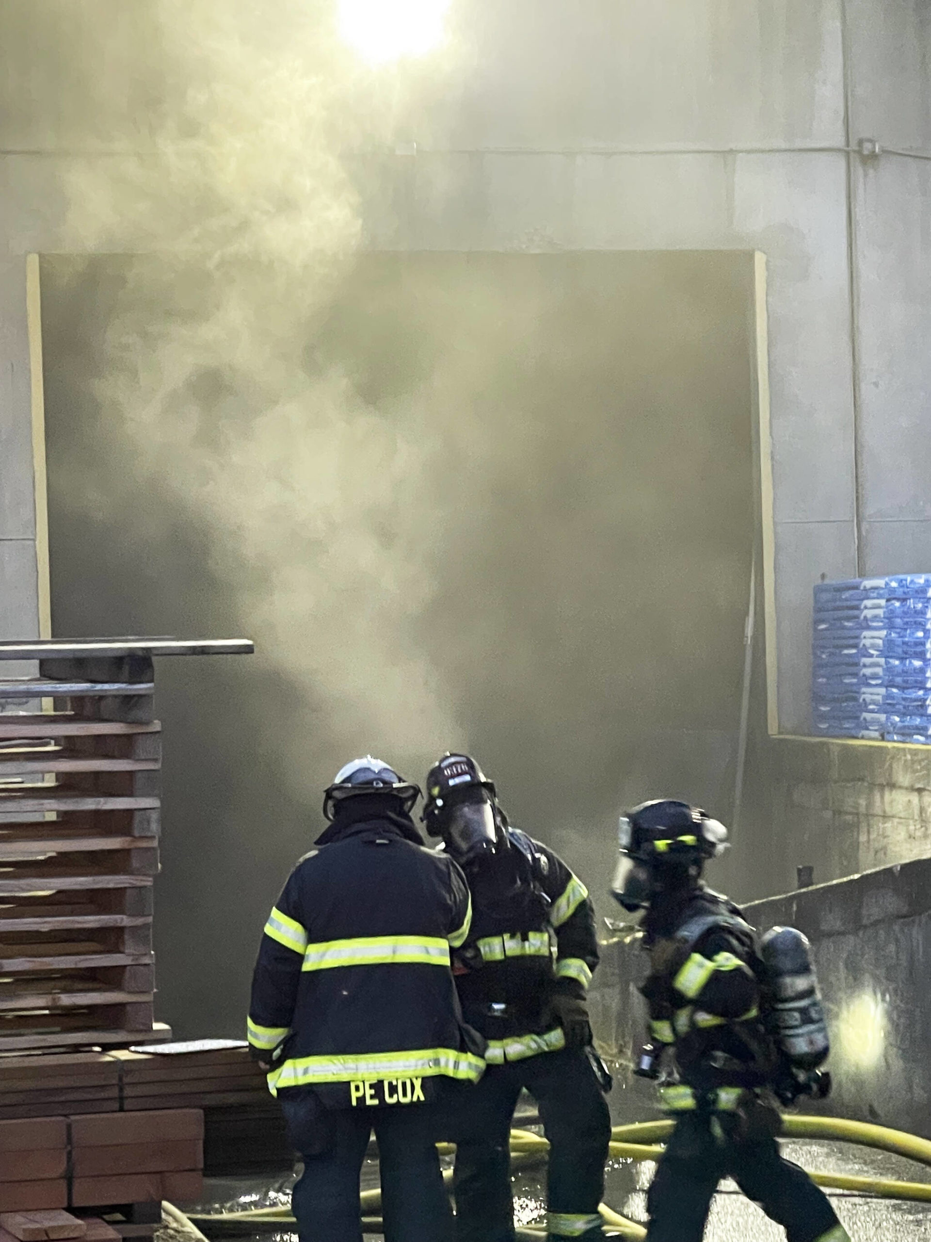 Firefighters battle a blaze July 6 at the Uresco Construction Materials Inc. warehouse, 8246 S. 194th St. COURTESY PHOTO, Puget Sound Fire
