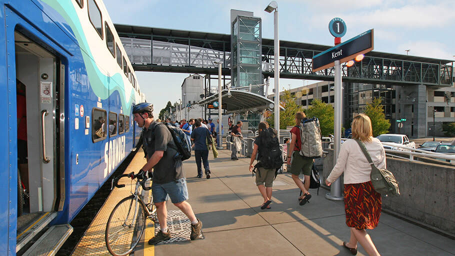 Sounder train passengers at Kent Station. Sound Transit plans to open a second parking garage in 2026. COURTESY PHOTO, Sound Transit