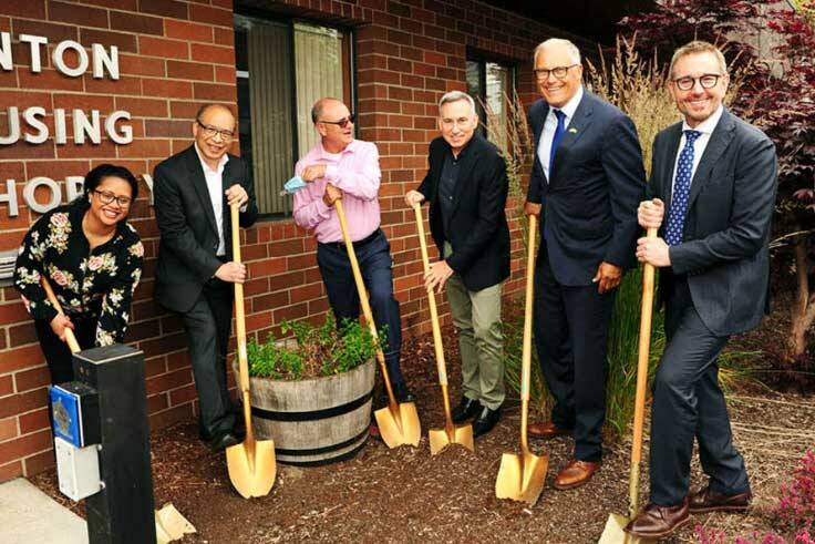 (Right most) Renton Mayor Armondo Pavone, (Second to right) Governor Jay Inslee, (Middle) and King County Executive Dow Constantine, as they celebrate the groundbreaking of the Sunset Gardens housing project. (Courtesy of the City of Renton)