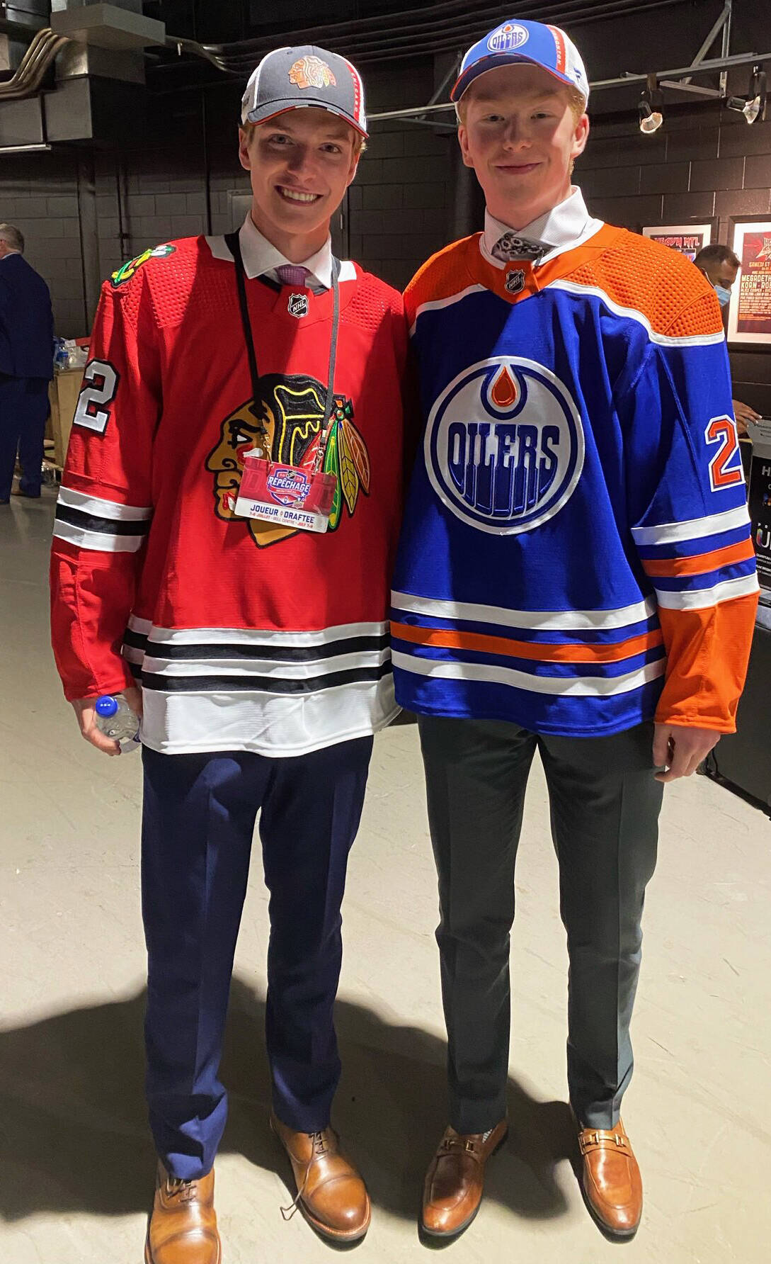 Seattle Thunderbird players Kevin Korchinski, left, drafted seventh overall by the Chicago Blackhawks; and Reid Schaefer, taken 32nd by Edmonton, at the NHL Draft headquarters July 7 in Montreal. COURTESY PHOTO, NHL