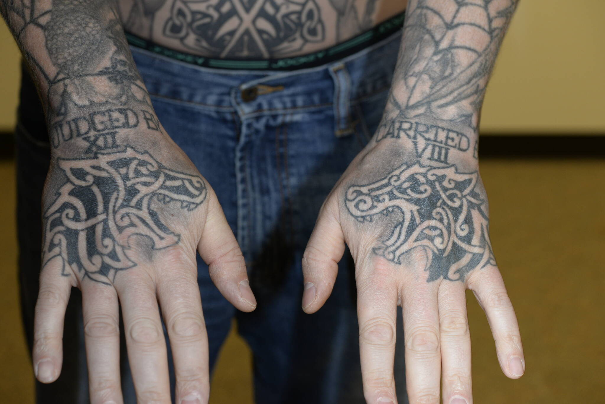 Photo of Auburn Police officer Jeffrey Nelson’s tattoos. A King County Superior Court Judge decided many of Nelson’s tattoos contained wording or imaging that would prejudice potential jurors. An additional 40 images have to be redacted prior to being released. (Courtesy photo)