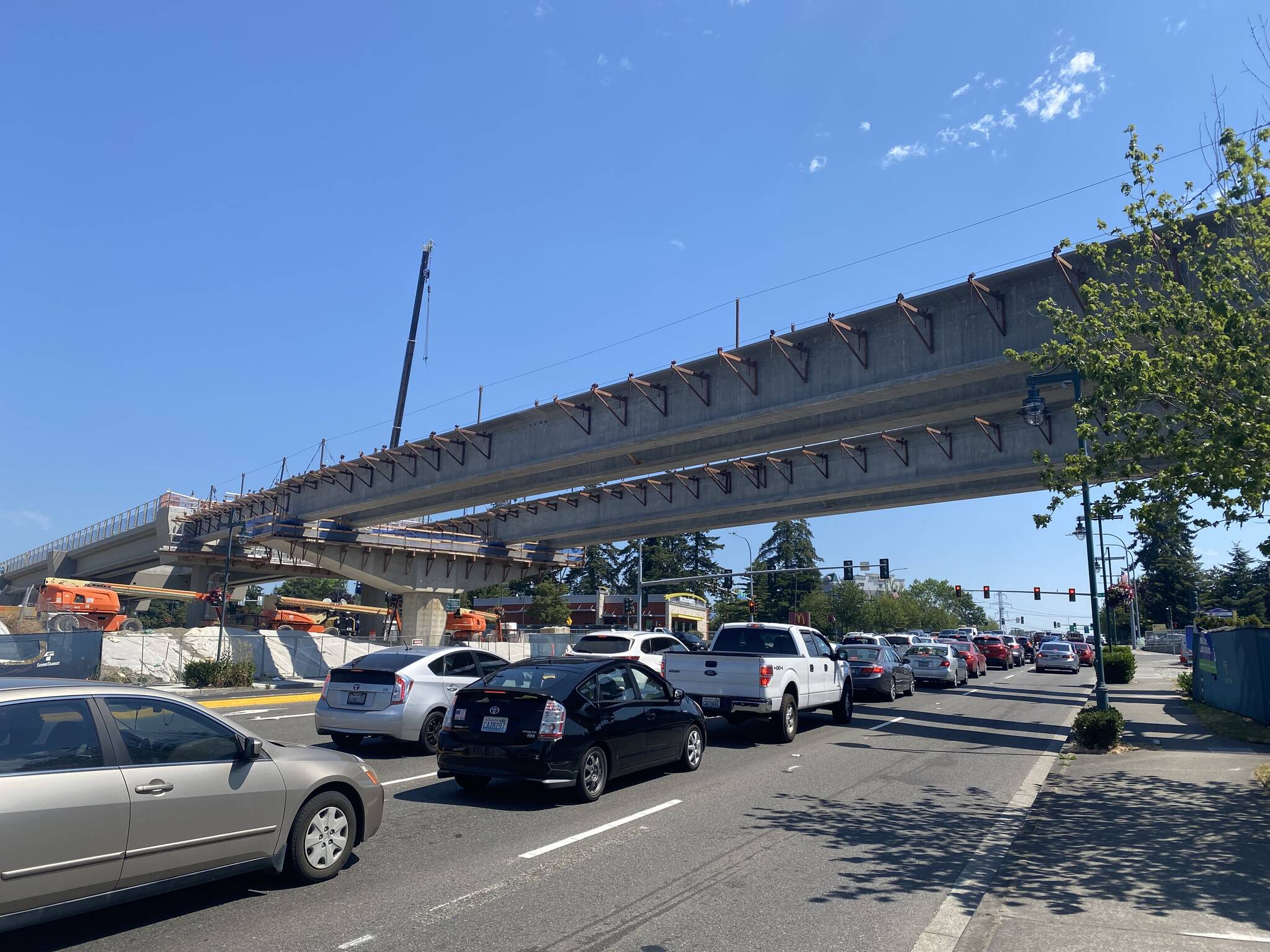 Cars drive under the newly installed elevated tracks in Federal Way on July 28. Olivia Sullivan/the Mirror